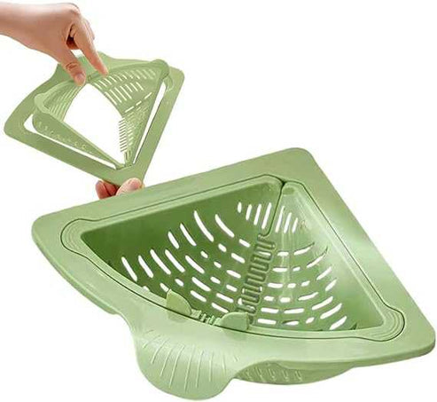 Space-saving corner sink organizer fitted in a kitchen sink